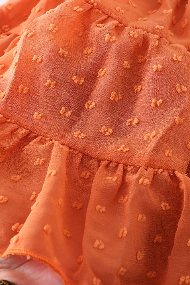 
                  
                    Orange floral print tiered dress
                  
                