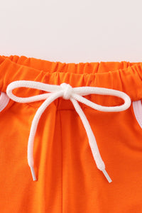 Orange boy shorts