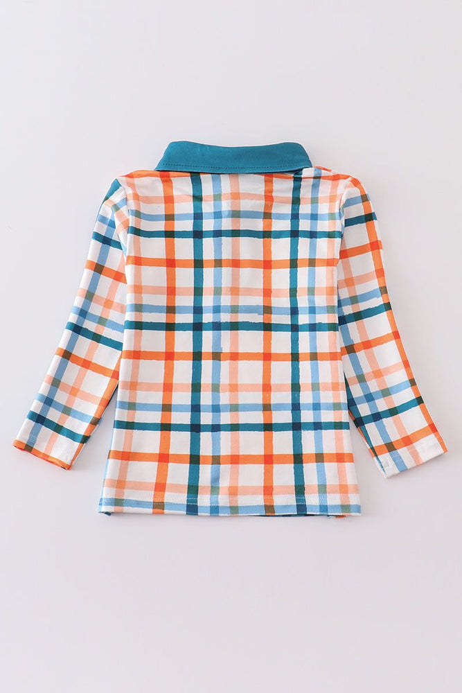 
                  
                    Multicolored plaid boy shirt
                  
                
